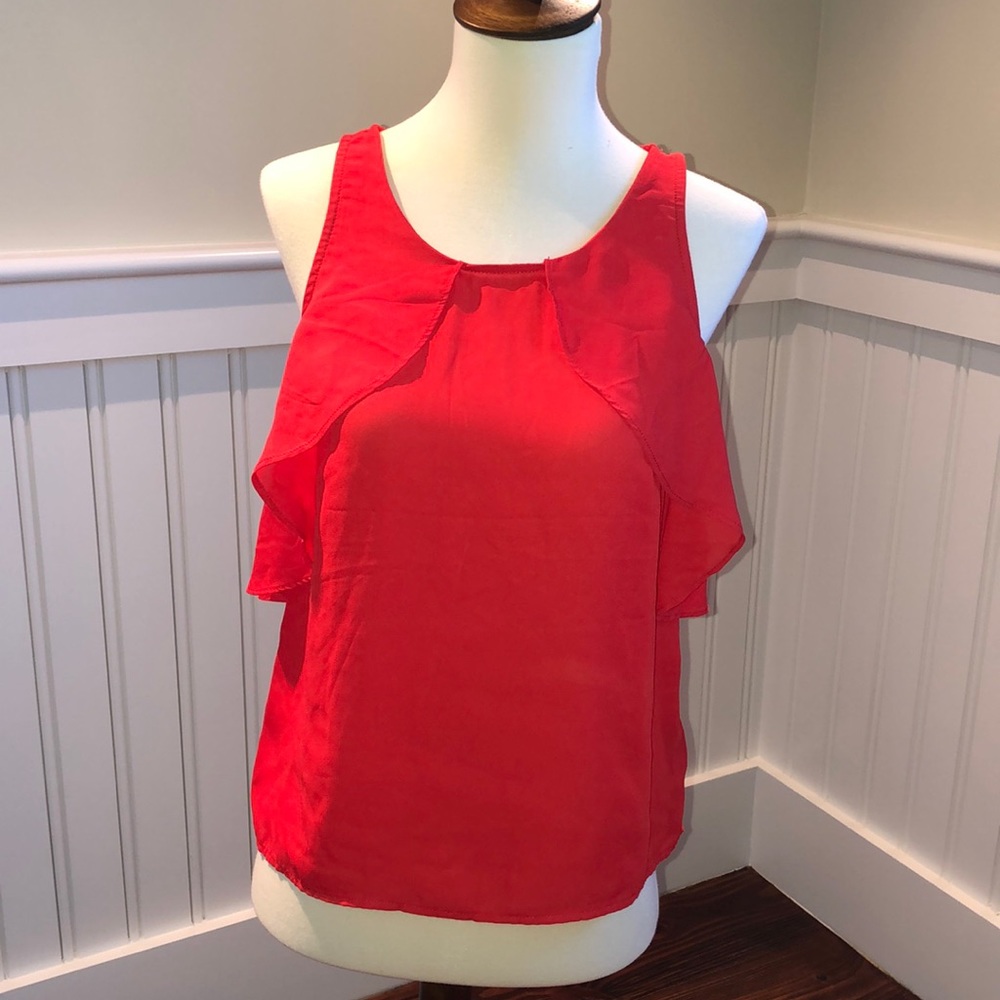 Red sleeveless blouse